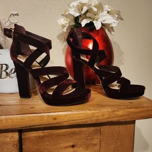 Never worn a Vince Camuto open-toe platform. Size 9 1/2 burgandy
